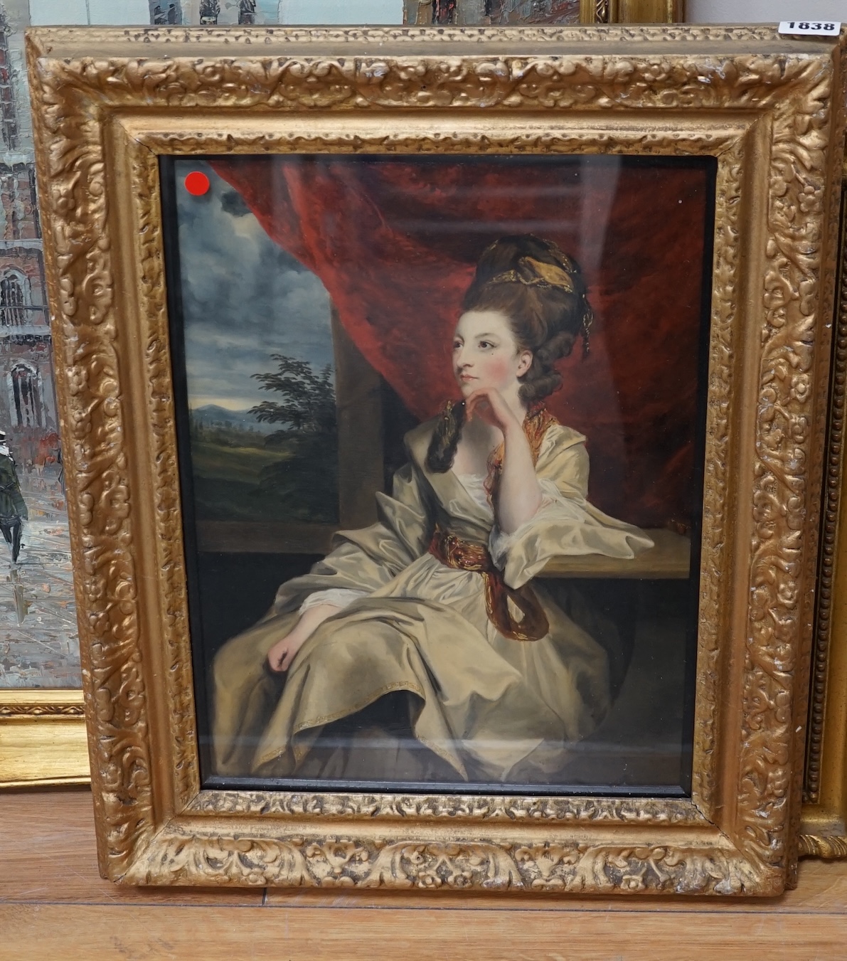 Late 18th / early 19th century, English School, oil, Portrait of a seated woman before a landscape, unsigned, 38 x 28cm. Condition - fair to good